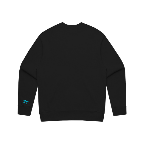 back of black sweater with 'TT' embroidered in blue on the bottom left sleeve 