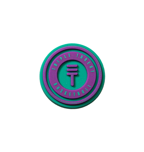 Triple Threat Jibbitz in teal and purple with the text 'Triple Threat Basketball' and the Triple Threat logo