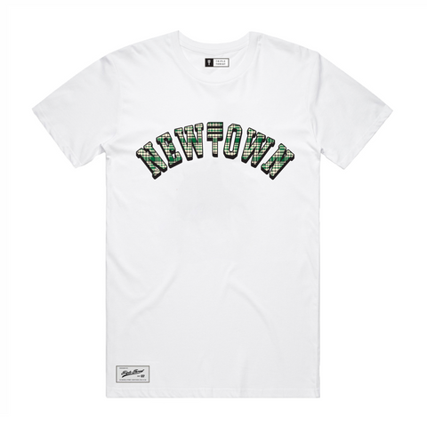 White t-shirt with green, cream and black plaid bold text of 'NEWTOWN' in the center featuring a brand patch lower corner 