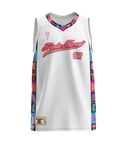 White basketball singlet with pink Triple Threat logo, colorful side panels featuring Triple Threat branding