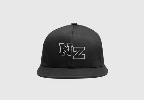 black Triple Threat snapback front on with white 'NZ' embroidered letters 