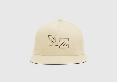 Front on view of Cream Triple Threat snapback with 'NZ' in block outlined letters in brown on front