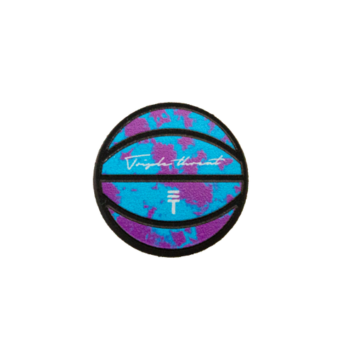  A round Triple Threat basketball jibbitz charm in blue and purple tie-dye colours, featuring a black outline and the Triple Threat logo and script across the middle