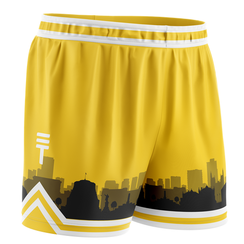 kids yellow basketball shorts with black skyline of Wellington at bottom with the Triple Threat logo and white trim on waistband and hem