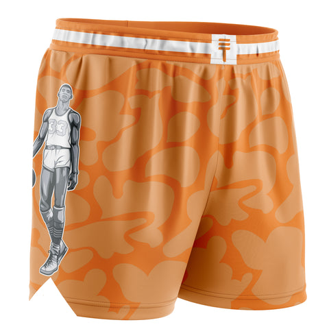 Orange basketball shorts with a camo pattern, featuring an illustration of Kareem Abdul-Jabbar on the side, an elastic waistband with white trim, and the Triple Threat logo