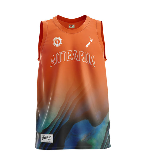 Orange basketball singlet with Paua design and New Zealand map logo and 'Aotearoa' in white text