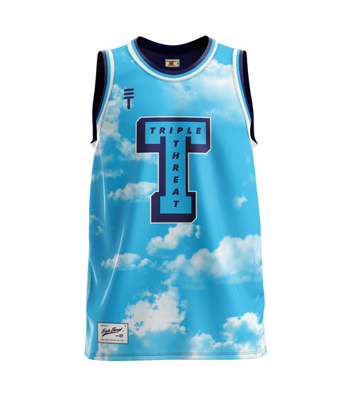 Basketball singlet with a vibrant cloud and sky design featuring a large T shape with the brand name Triple Threat and the Triple Threat logo