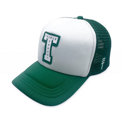 Triple Threat Block Trucker Hat in green with a breathable mesh back, adjustable snapback closure, structured front panels, and high-quality embroidered logo